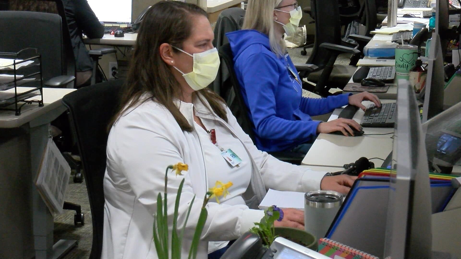 Tracy Verkler-Lehner, RN - Checks medical records of her patients.jpg